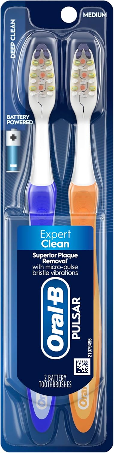 Highlights the vibrating bristles and cleaning mechanism.